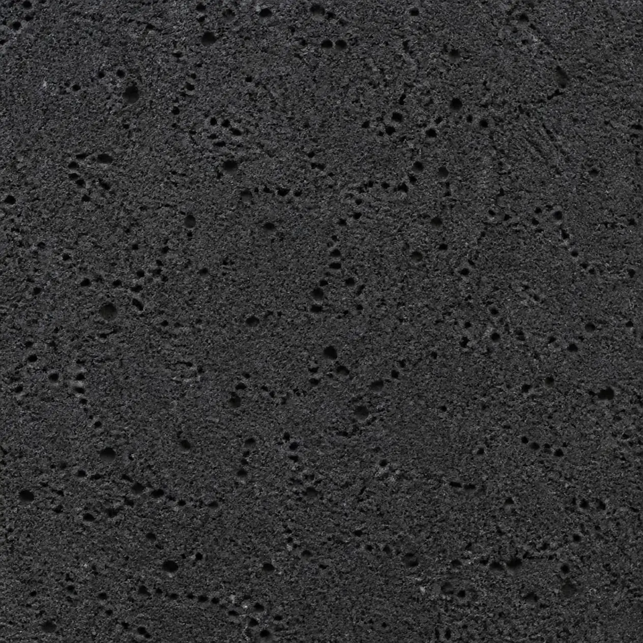 Close-up of Black Lava Stone showing natural volcanic porosity