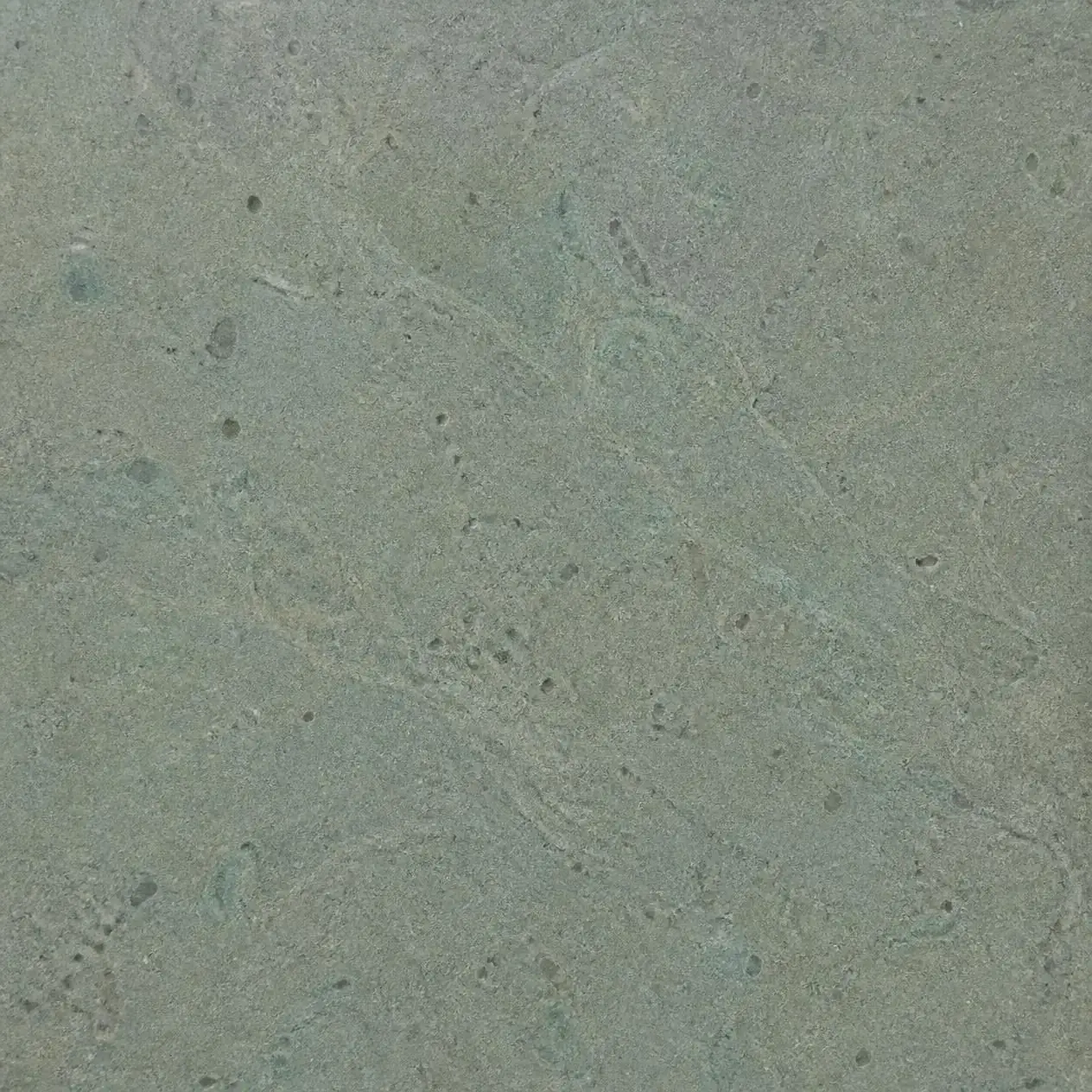 Close-up of a sawn cut Sukabumi Green Stone tile surface